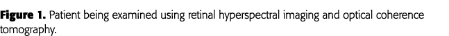 Figure 1  Patient being examined using retinal hyperspectral imaging and optical coherence tomography 