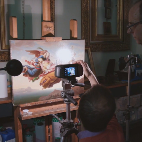 Photo of Specim HSI Camera examining painting