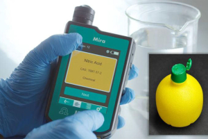 Photo of the MIRA DS spectrometer and a squeeze bottle