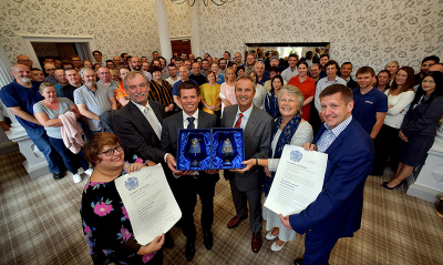 Markes International employees at the presentation of the two Queen’s Awards for Enterprise.