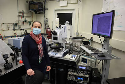 Dr Kendra Furber at the Mid-IR beamline of the Canadian Light Source. Photo of Kendra Furber with her FT-IR imaging instrumentation