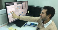 SESAME XAFS/XRF beamline scientist, Messaoud Harfouche, points out SESAME’s first monochromatic light. Image: SESAME