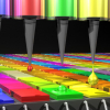 In this illustration, the Quantum Dot (QD) spectrometer device is printing QD filters—a key fabrication step. Other spectrometer approaches have complicated systems in order to create the optical structures needed. Here in the QD spectrometer approach, the optical structure, QD filters, are generated by printing liquid droplets. This approach is unique and advantageous in terms of flexibility, simplicity and cost reduction. Image: Mary O’Reilly