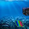 Depiction of underwater robot scanning a reef.